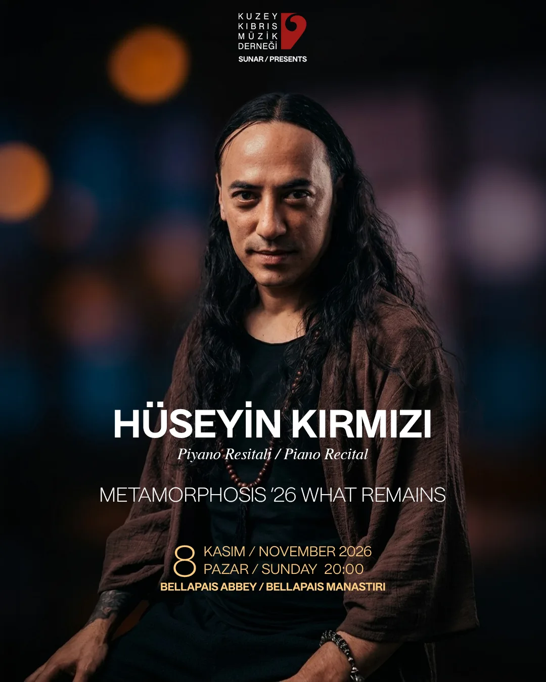 Kuzey Kıbrıs Müzik Derneği poster: Hüseyin Kırmızı with long dark hair in a brown jacket; Piyano Resitali / Piano Recital, Metamorphosis '26 What Remains, 8 Kasım/November 2026, Pazar/Sunday 20:00, Bellapais Abbey