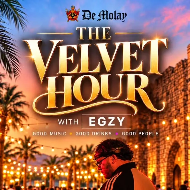 De Molay poster: 'The Velvet Hour with EGZY' in gold lettering over a sunset scene of palm trees, string lights and stone Gothic church walls, DJ EGZY in headphones and glasses below; Good music, good drinks, good people