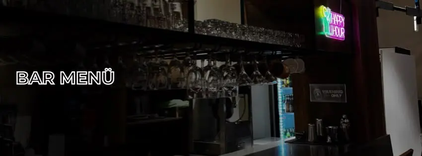 Venue photo, not an event poster: the bar at MyArt Aktivite Merkezi, Famagusta, with glass racks and a neon 'Happy Hour' sign