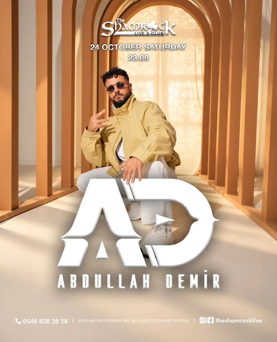 The Shamrock poster: Abdullah Demir in a cream jacket and sunglasses seated among arches, large AD logo; 24 October Saturday, 23:00; 0548 828 28 28