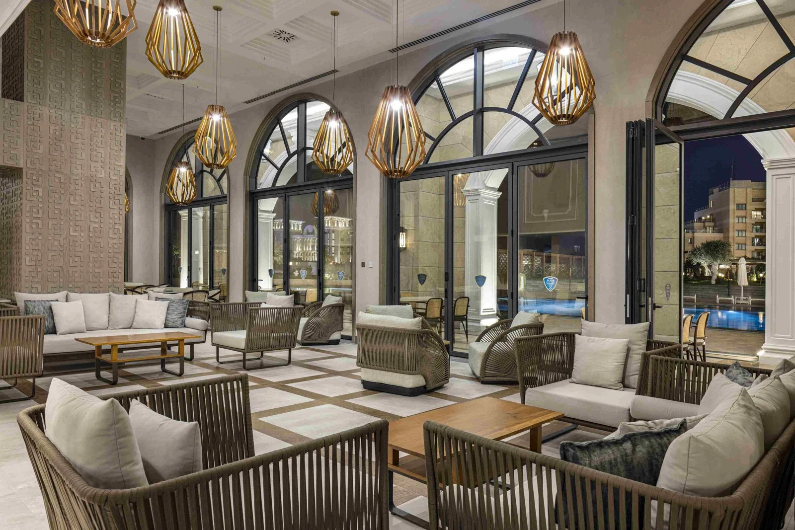 Lounge with arched windows at Merit Royal Diamond Hotel