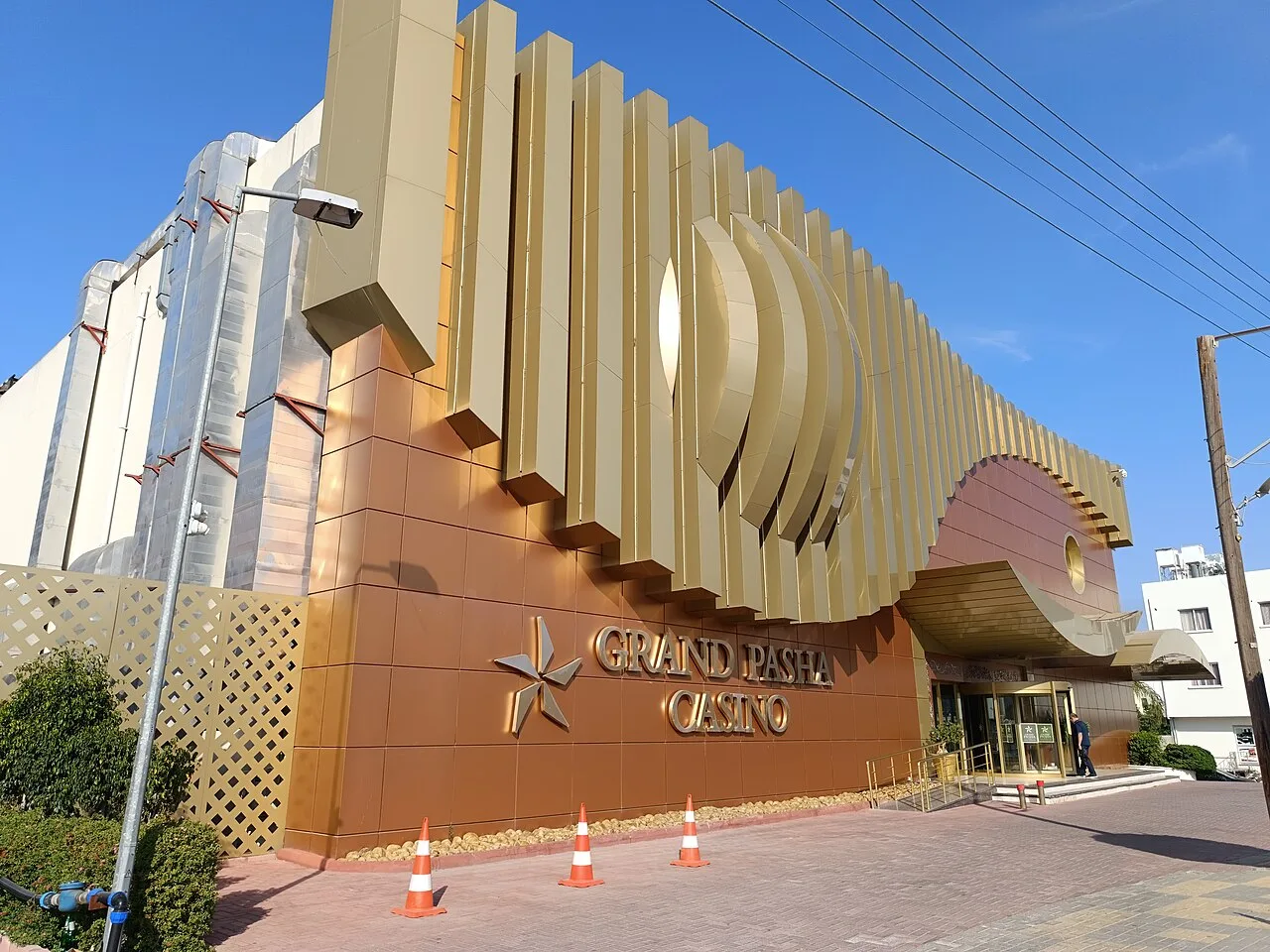 Gold-finned facade and entrance of Grand Pasha Casino in Girne (Kyrenia)